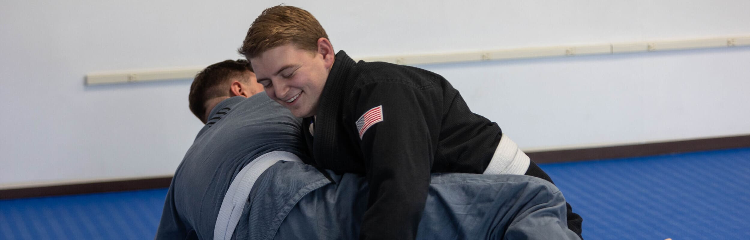 two brazilian jiu jitsu students train on the mats in Wilkes Barre PA