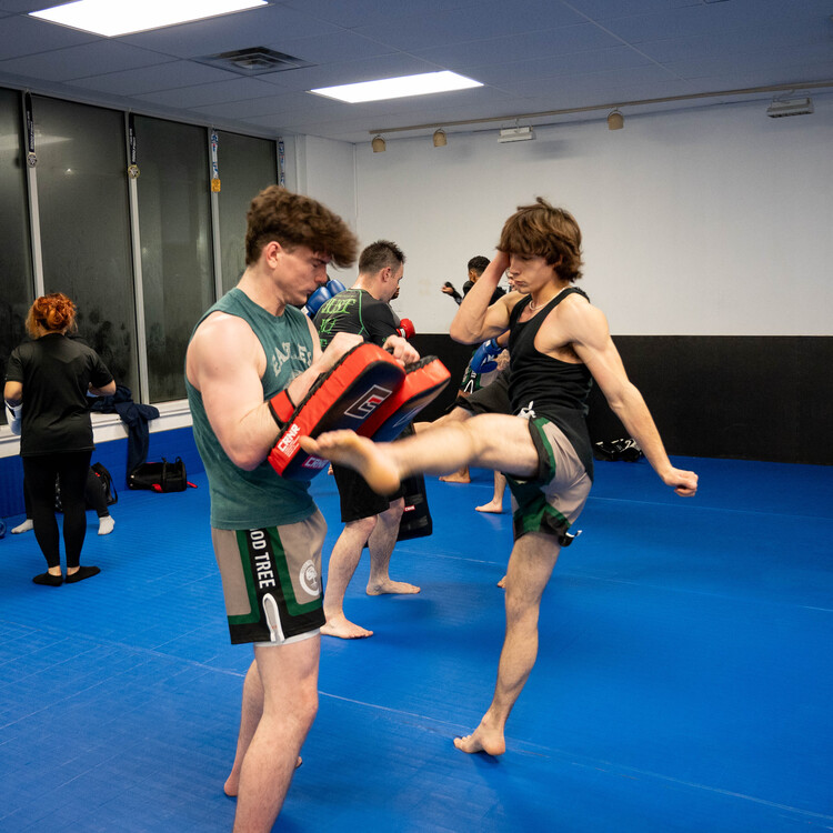 a forceful kick during striking training!